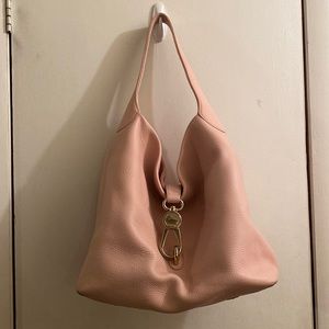 Used dooney and Bourke logo lock hobo bag